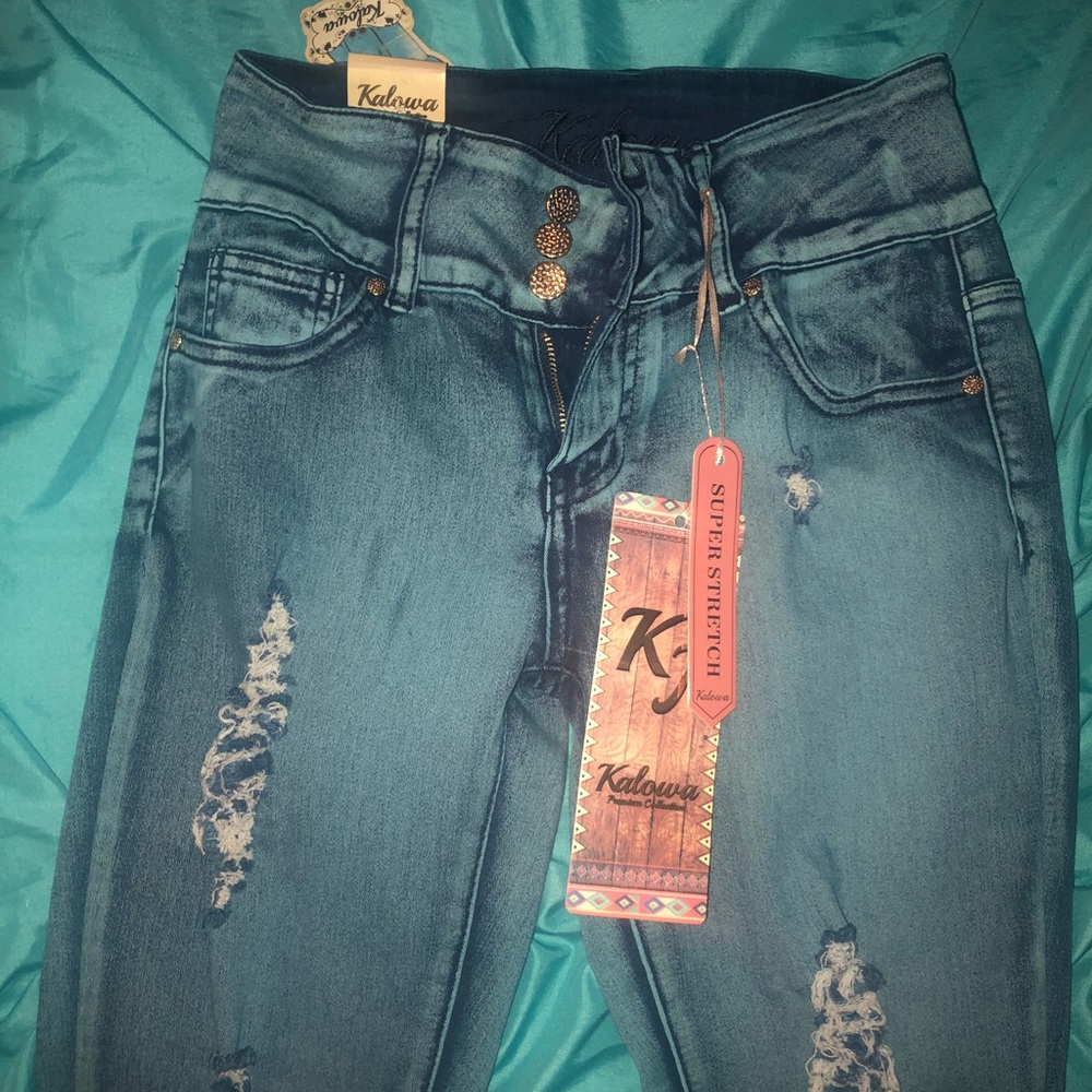 Light/ dark wash capris with rips